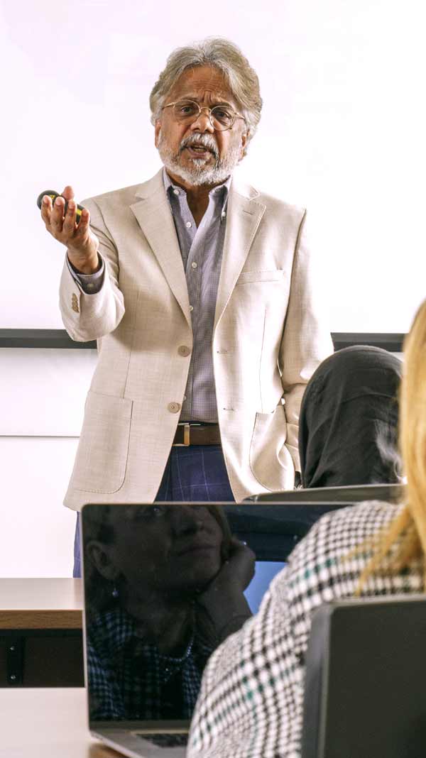 Professor teaching in front of a class